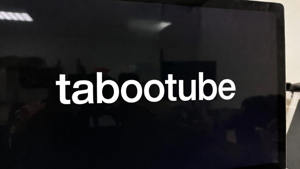 Tabootube logo displayed on a dark computer screen
